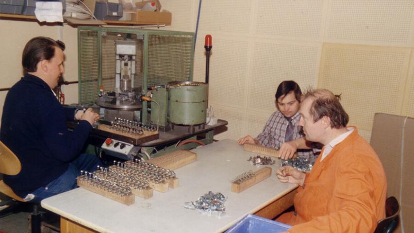 1985 - Drei Mitarbeiter der Industriemontage in der Betriebsstätte Mitte